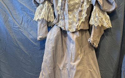 Blue two-piece day dress with crochet details, c. 1895-1899